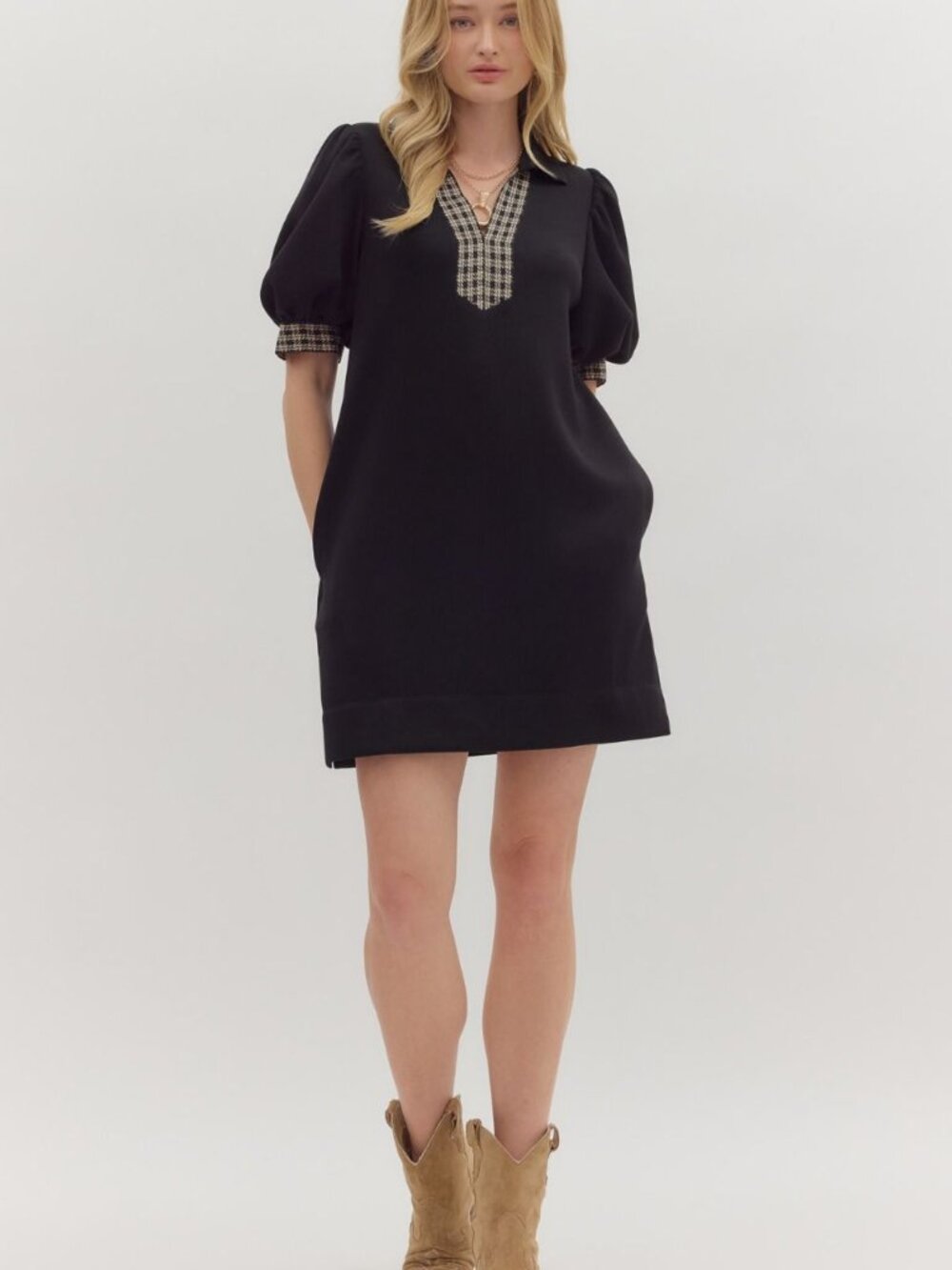 Solid jersey knit mini dress featuring houndstooth v neck and sleeve